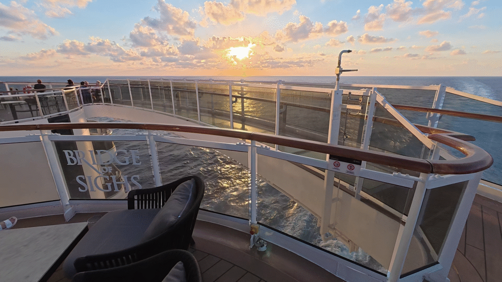 MSC Seascape Bridge of Sighs glass walkway extending over the aft of the ship, offering panoramic ocean views and a scenic place to walk above the pool decks.