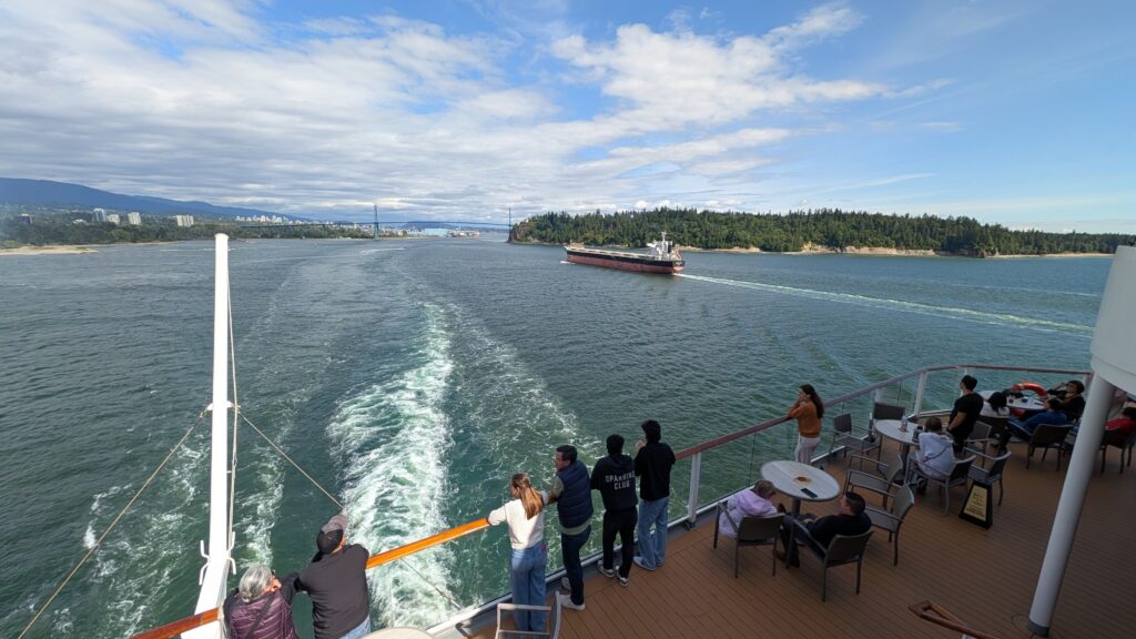 Celebrity Solstice sailing away from Vancouver at the start of a 7-night Alaska cruise.