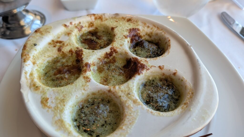 Escargot served in the Grand Epernay Restaurant aboard Celebrity Solstice