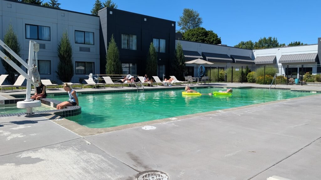 Outdoor swimming pool at the Country Inn & Suites by Radisson Seattle-Bothell.