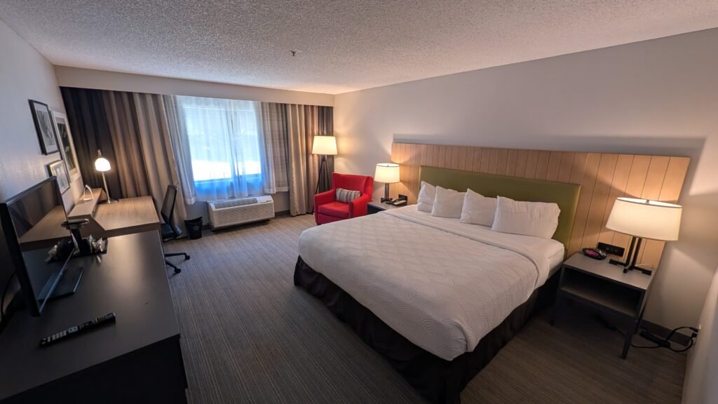 King Suite bedroom at the Country Inn & Suites by Radisson Seattle-Bothell.