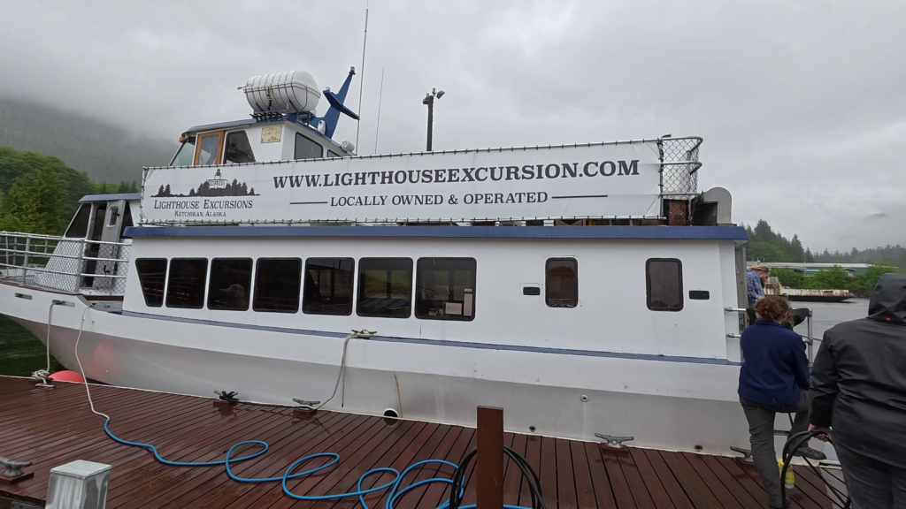 Lighthouse Excursions boat docked in Ward Cove before the Lighthouse Totems & Eagles Excursion in Ketchikan, Alaska.
