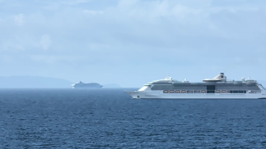 Cruise ships sailing near the Celebrity Solstice during the final sea day of an Alaska cruise.