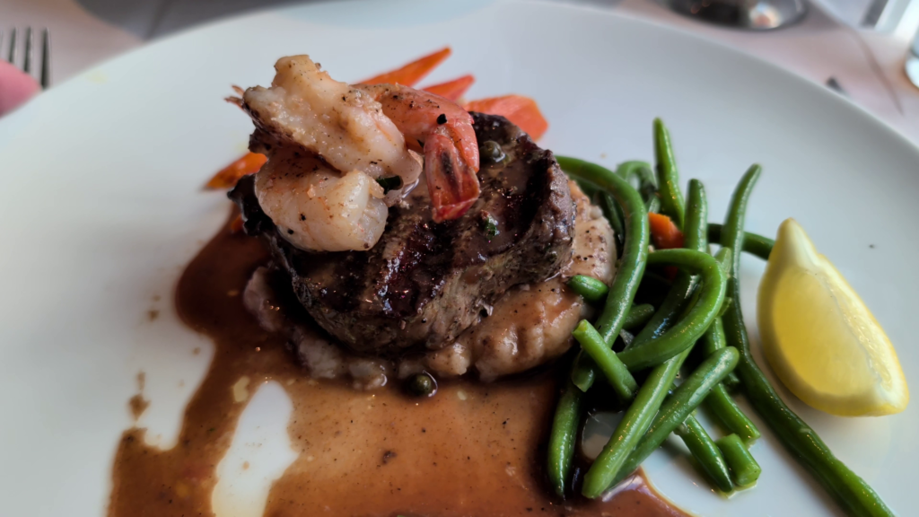 Filet mignon with shrimp served in the Celebrity Solstice main dining room