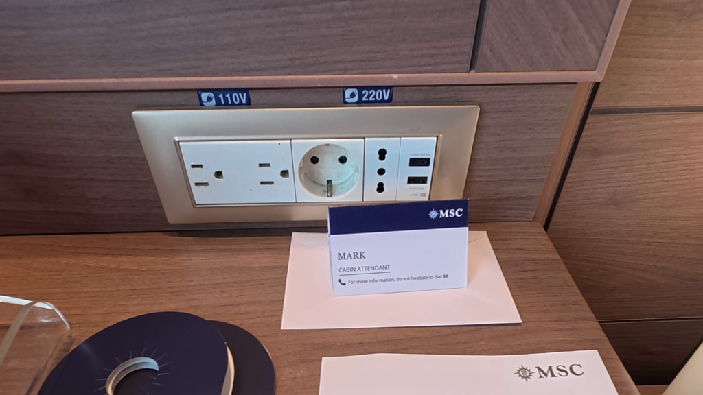 Electrical outlets and USB charging ports in MSC Poesia aft balcony cabin 11250.