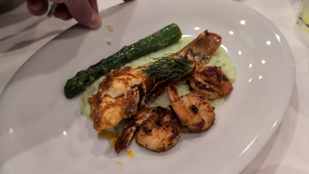 Duo of Broiled Lobster Tail and Jumbo Shrimp served during Gala Night aboard MSC Poesia.