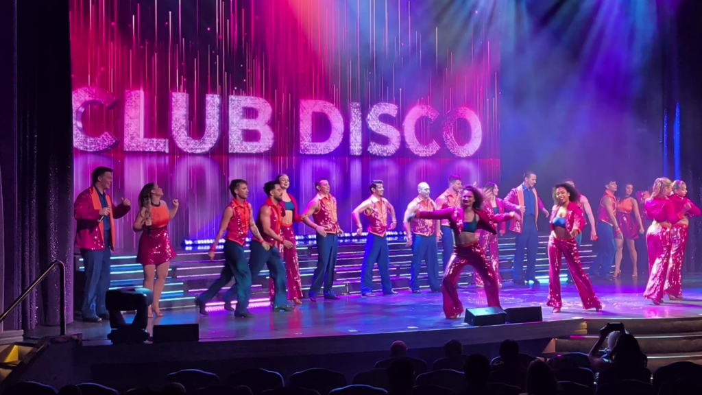 Club Disco production show with singers and dancers performing in Teatro Carlo Felice aboard MSC Poesia.