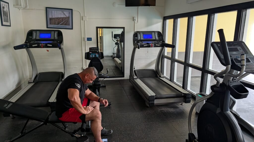 Fitness center at Ramada Spokane Airport with treadmills, exercise bikes, and basic workout equipment.