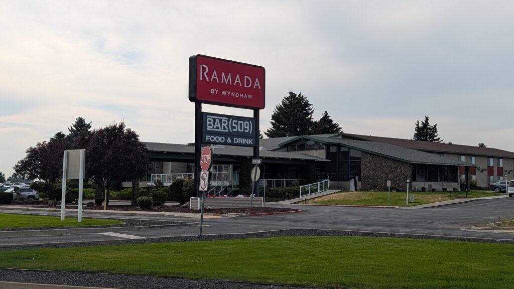 Ramada by Wyndham Spokane Airport sign and hotel exterior