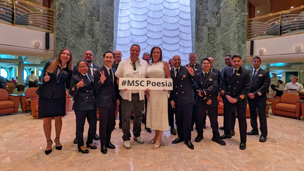 White Night aboard MSC Poesia with cruise ship officers in the atrium