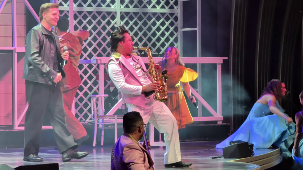 Dirty Dancing The Celebration live show aboard MSC Poesia with saxophone player and performers