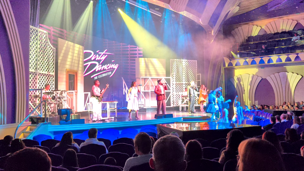 Singers, dancers, and live musicians perform Dirty Dancing: The Celebration aboard MSC Poesia.
